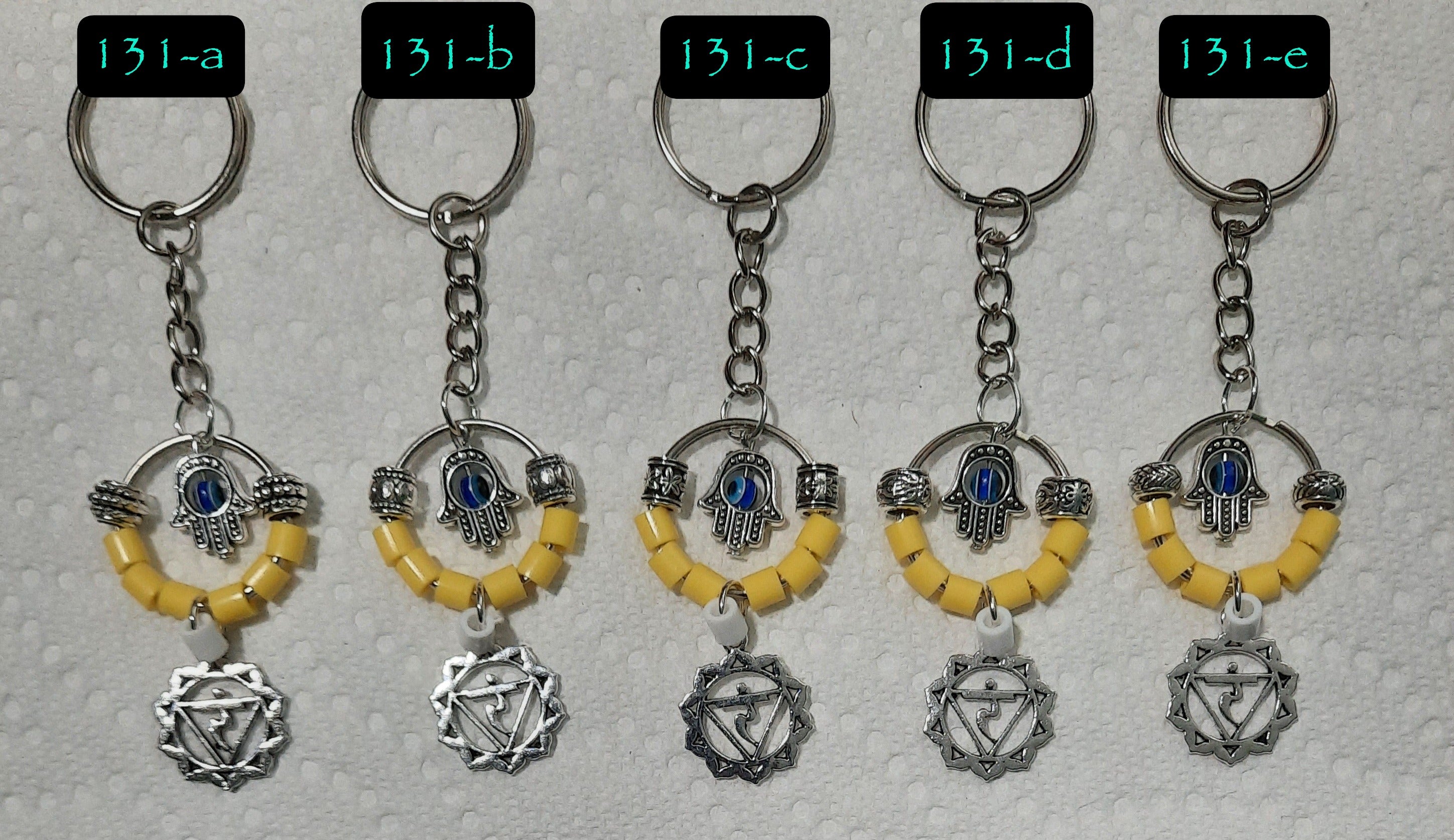 CHAKRA SYMBOL w/HAMSA HAND