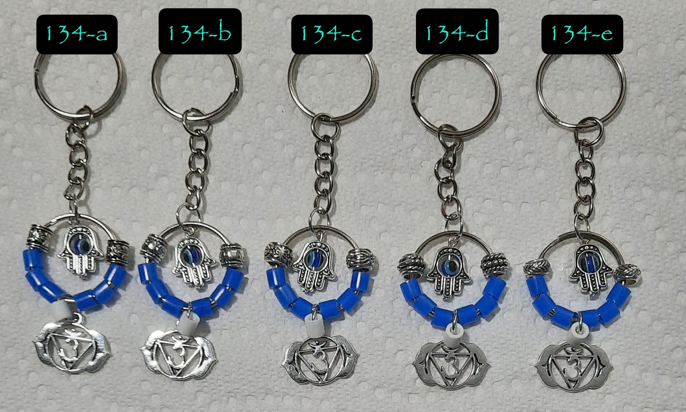 CHAKRA SYMBOL w/HAMSA HAND